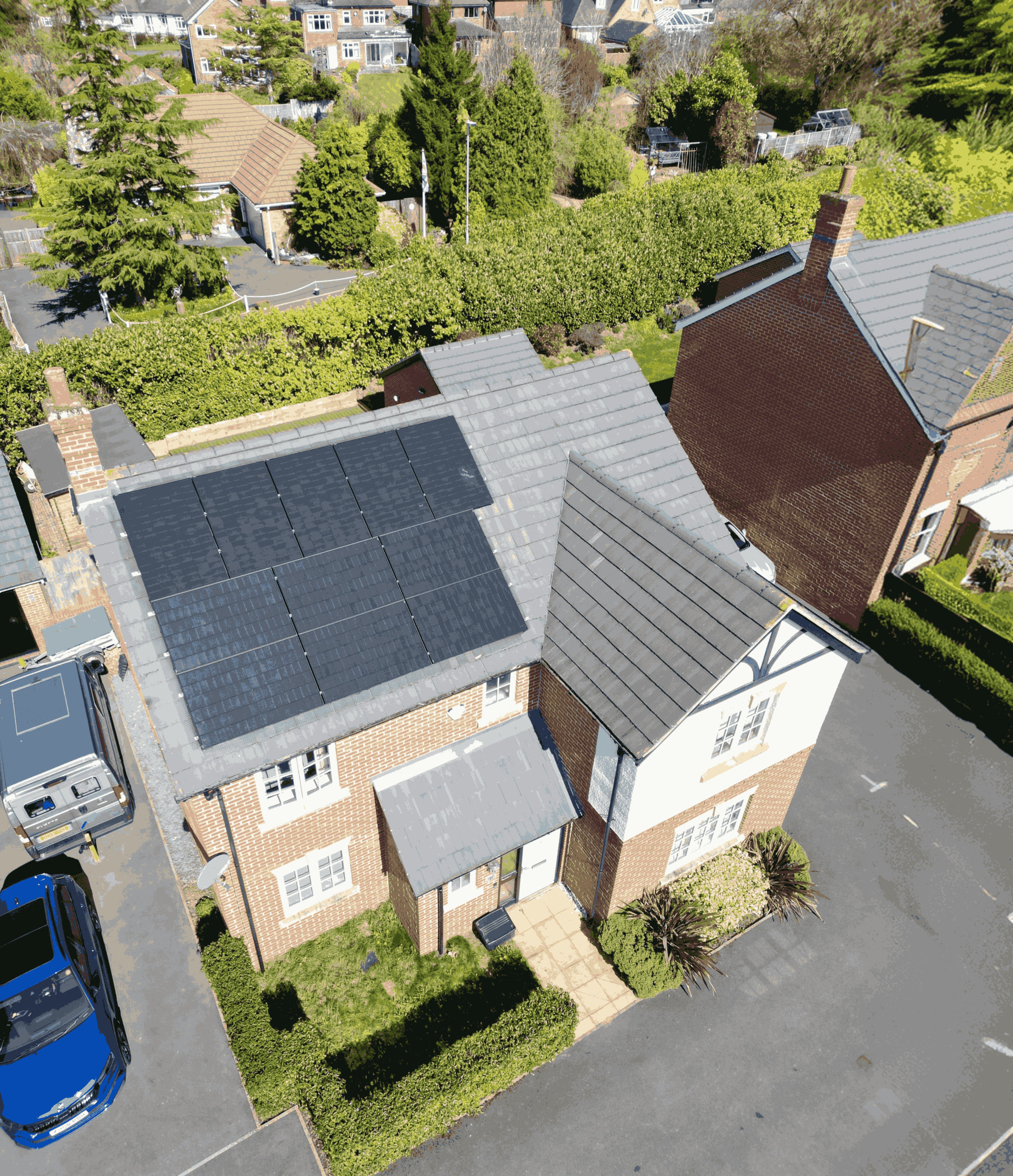 aerial view of a house that has solar panels