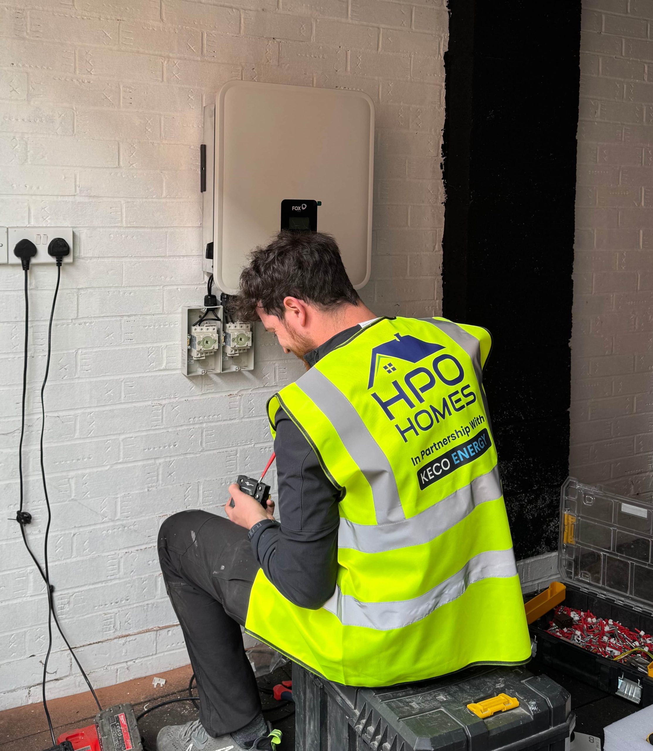 Image of HPO working on a battery set up